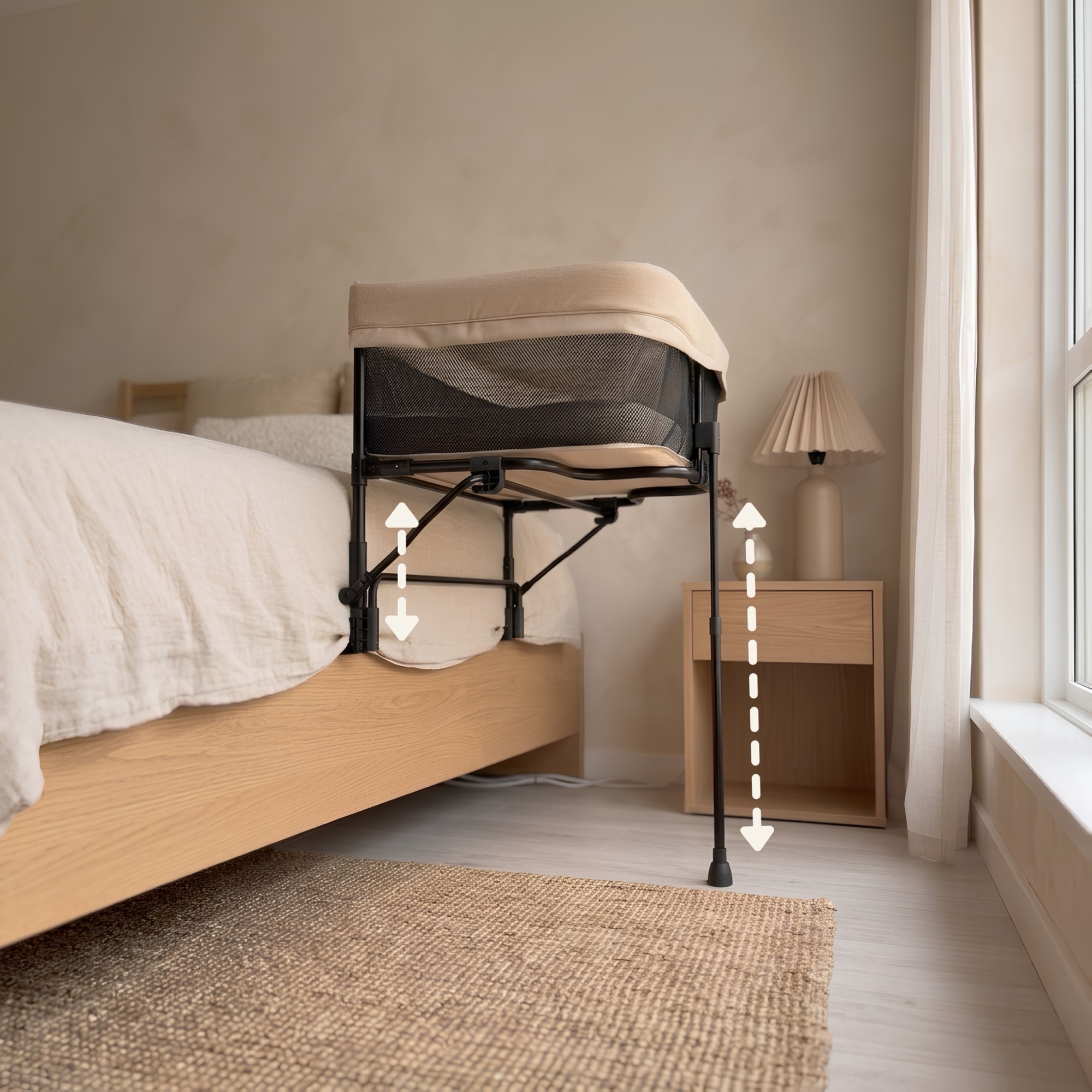 The co-sleeper with adjustable-height legs shown beside the bed